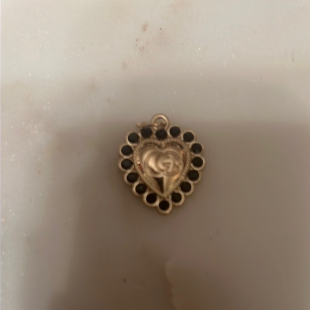 Heart-Shaped Gold and Black Pendant Charm